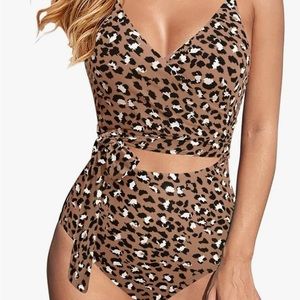 Amazon brand front wrap one piece. Super flattering, great quality and in EUC.